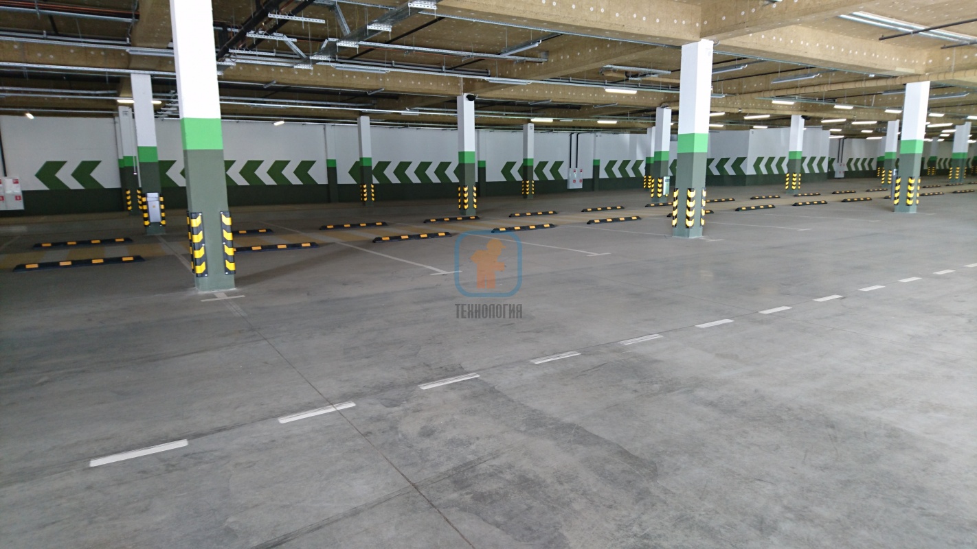 Парковка супермаркета «Табрис», оборудованная демпферами и резиновыми отбойниками для колес КР-1,83